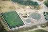 A leachate treatment plant with a reed bed (left)