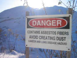 Image shows a hazardous construction waste type asbestos warning.