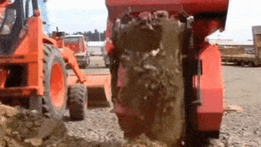 Image shows: The new way to recycle concrete using a mobile track-fitted mini crusher.